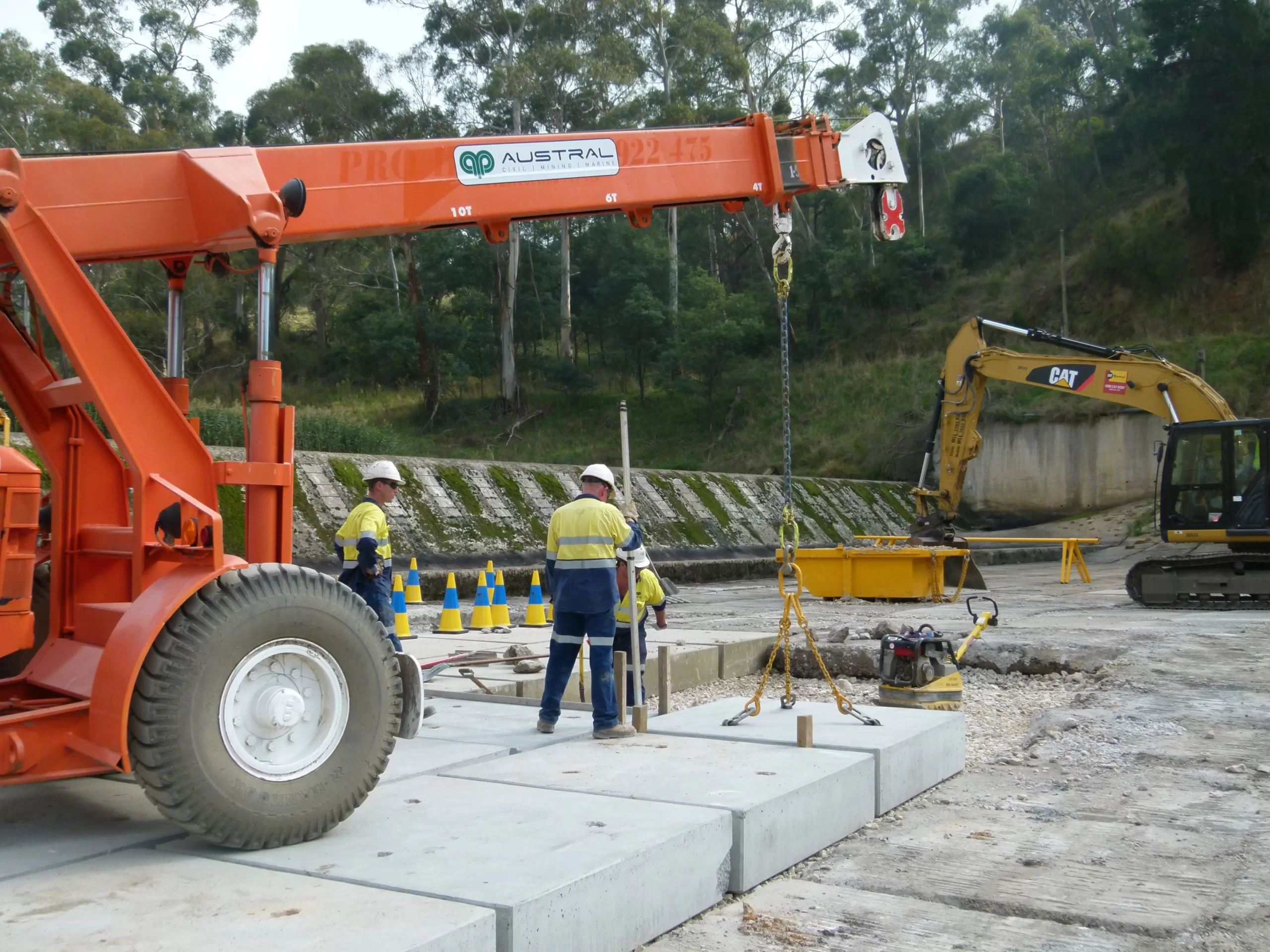 Construction workers conducting a project for river outfall